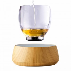nieuwe 360 ​​draaiende magnetische levitating X cup, drijvende glazen cup